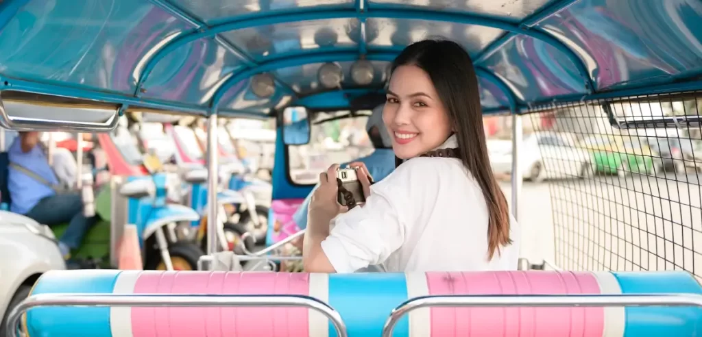 Thai Ladyboys And Buddhism - Ladyboy in a bus in Bangkok